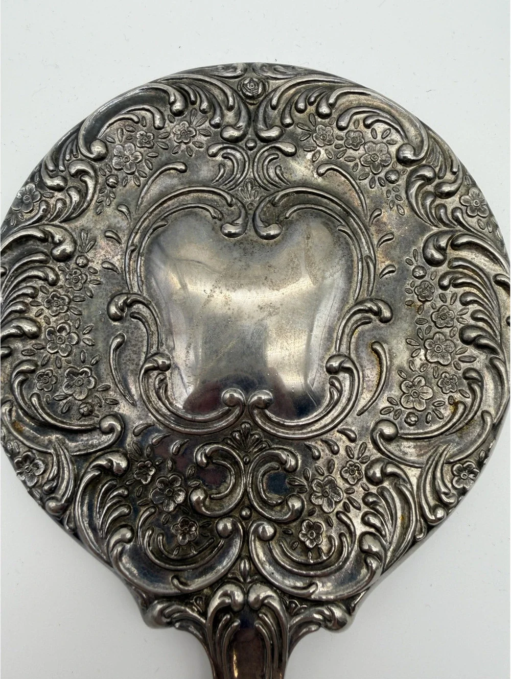 Vintage Ornate Silver Handheld Mirror with Floral Engraving
